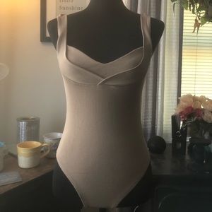 H&M Tan Bodysuit
Size Small